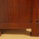 Antique chest of drawers with cross motifs, made entirely of solid walnut.