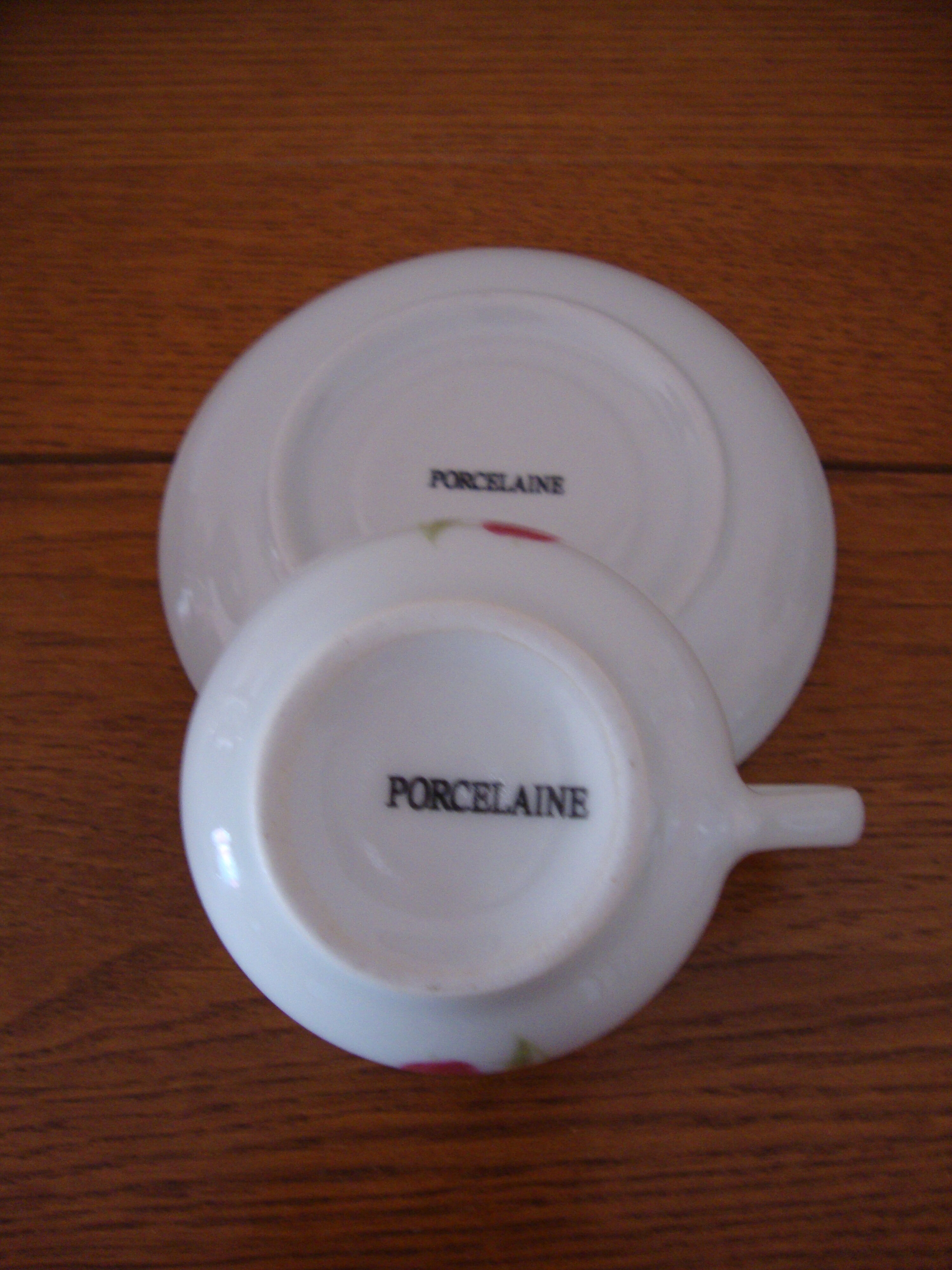 6 old white porcelain coffee cups decorated with tulips