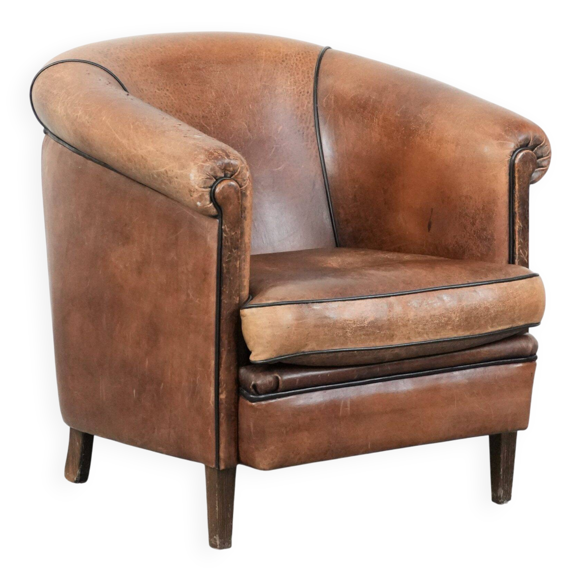 Sturdy vintage sheepskin club armchair with a beautiful patina