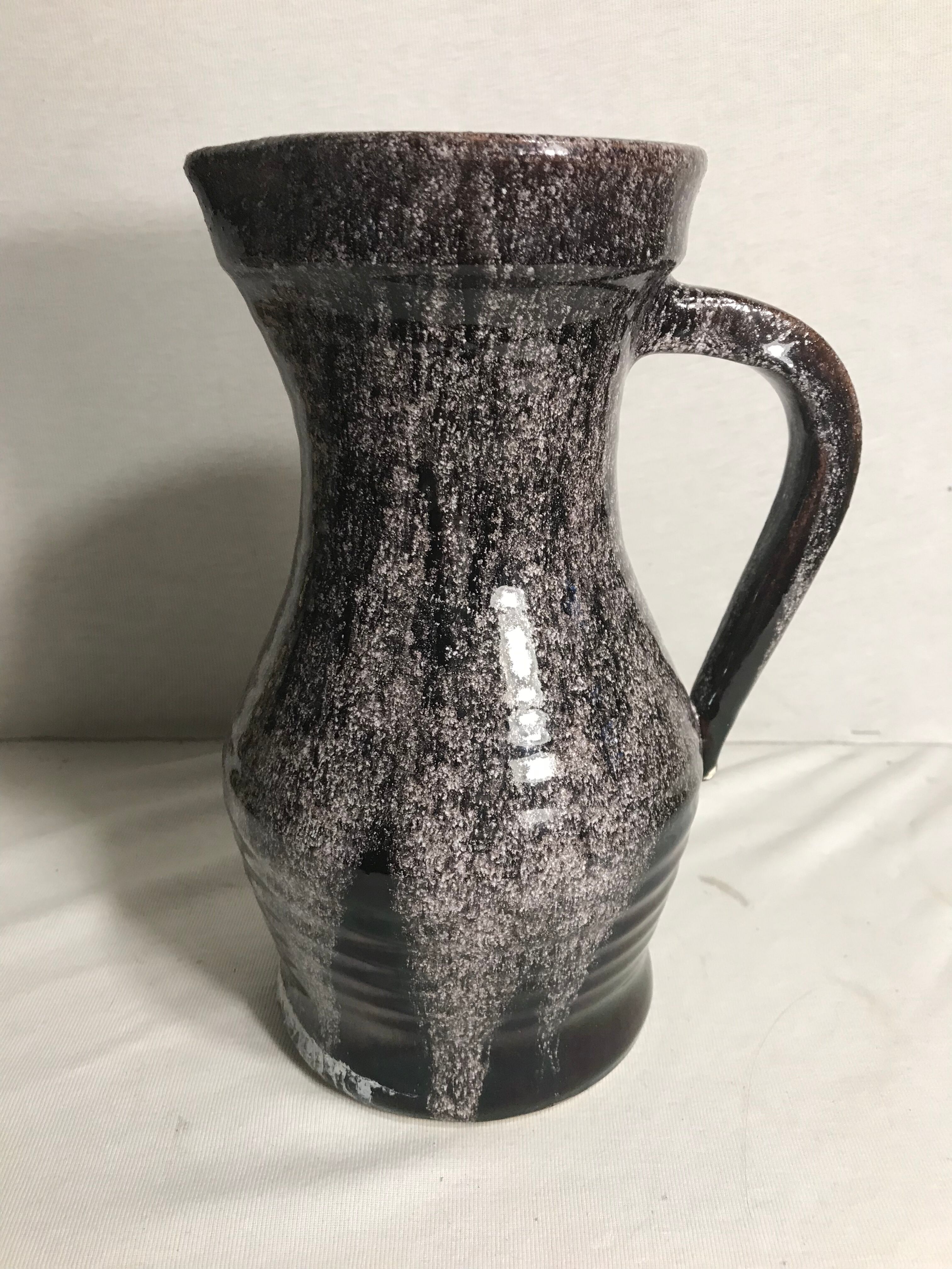 Old ceramic accolay jug, grey-black