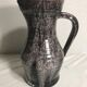 Old ceramic accolay jug, grey-black