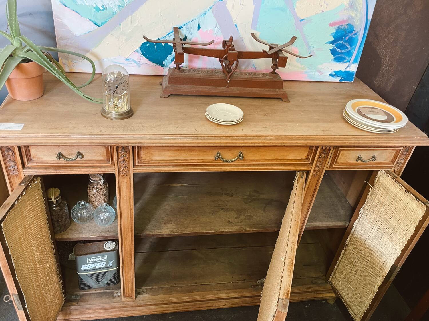 Classic vintage buffet with 3 doors in wood and raffia.