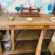 Classic vintage buffet with 3 doors in wood and raffia.