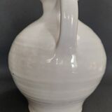 White ceramic goat-shaped creamer, first half of the 20th century.