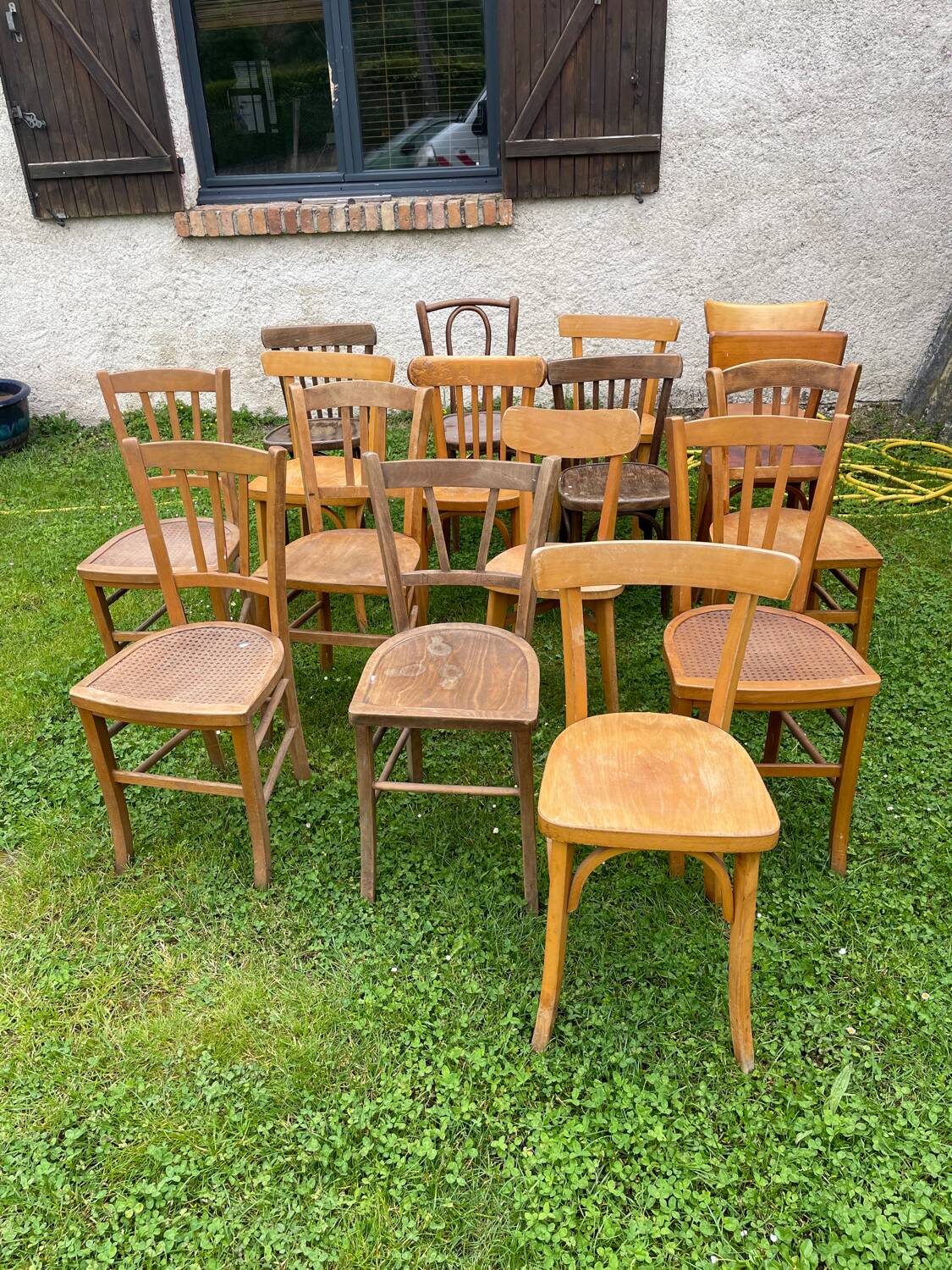 Lot of 16 mismatched bistro chairs