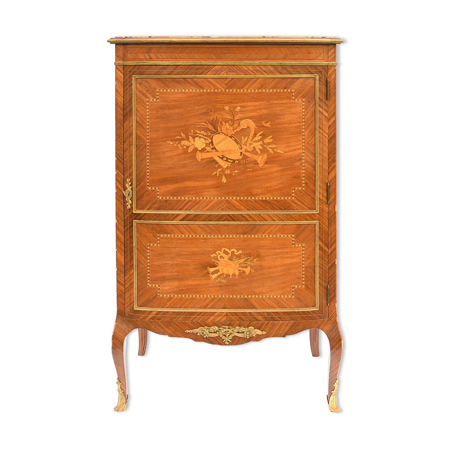 In-between furniture in marquetry decorated with a trophy decoration of musical instruments