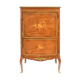 In-between furniture in marquetry decorated with a trophy decoration of musical instruments