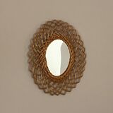 Sun mirror in woven rattan. 1960.