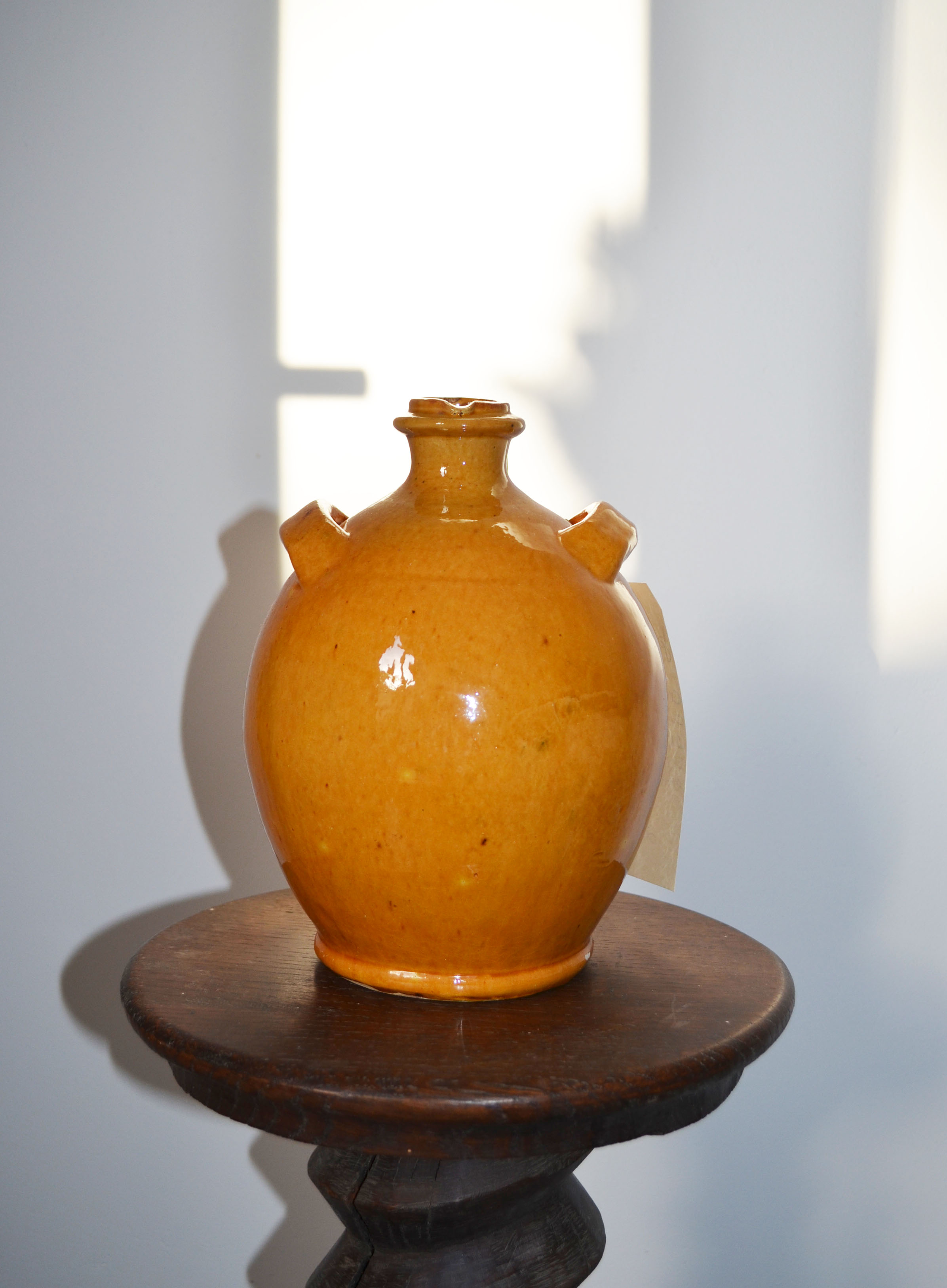 Biot jug in glazed ochre ceramic