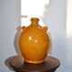 Biot jug in glazed ochre ceramic