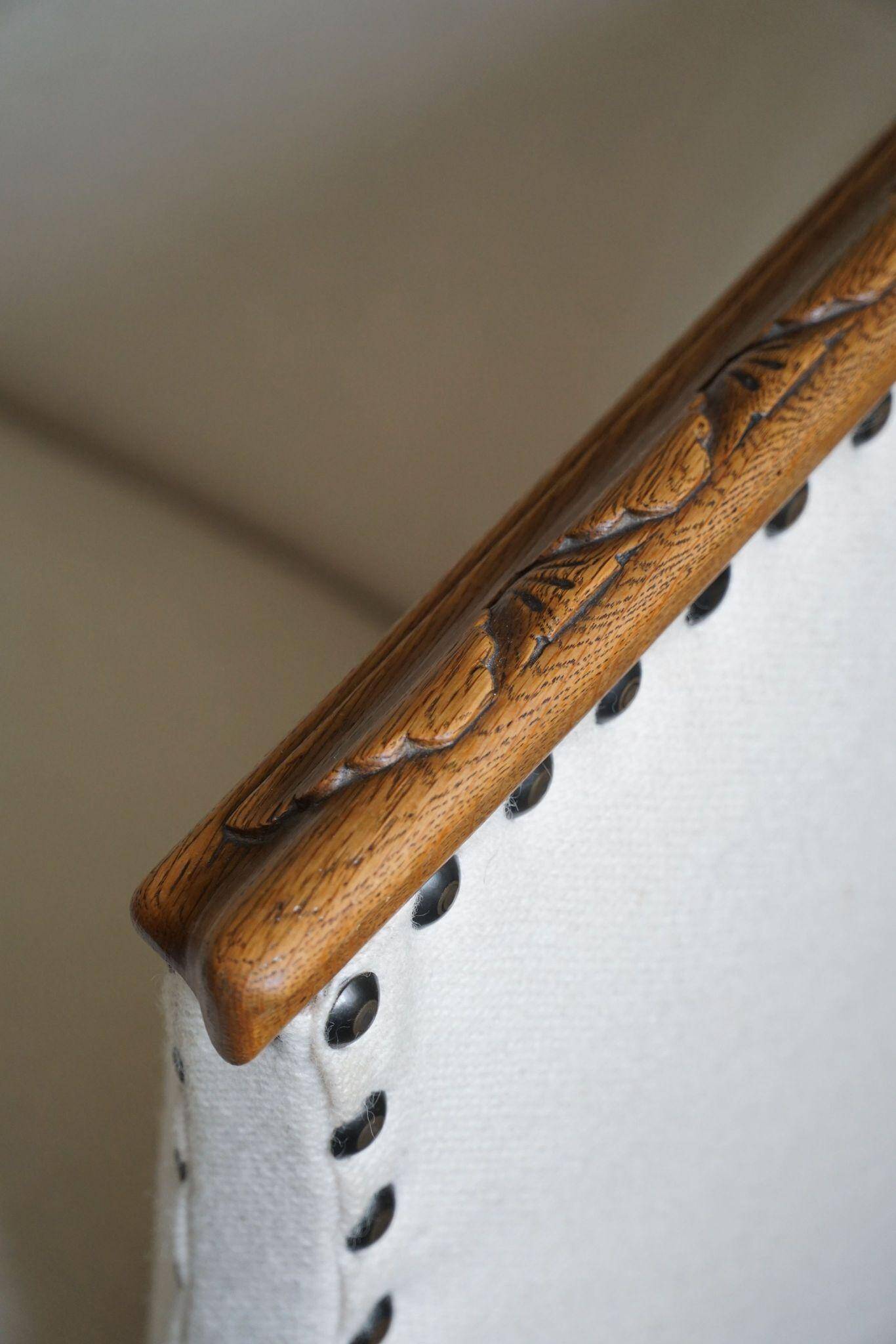 Sculptural 2-seater canapé in oak and wool, Danish "Skønvirke" style, 1920s.