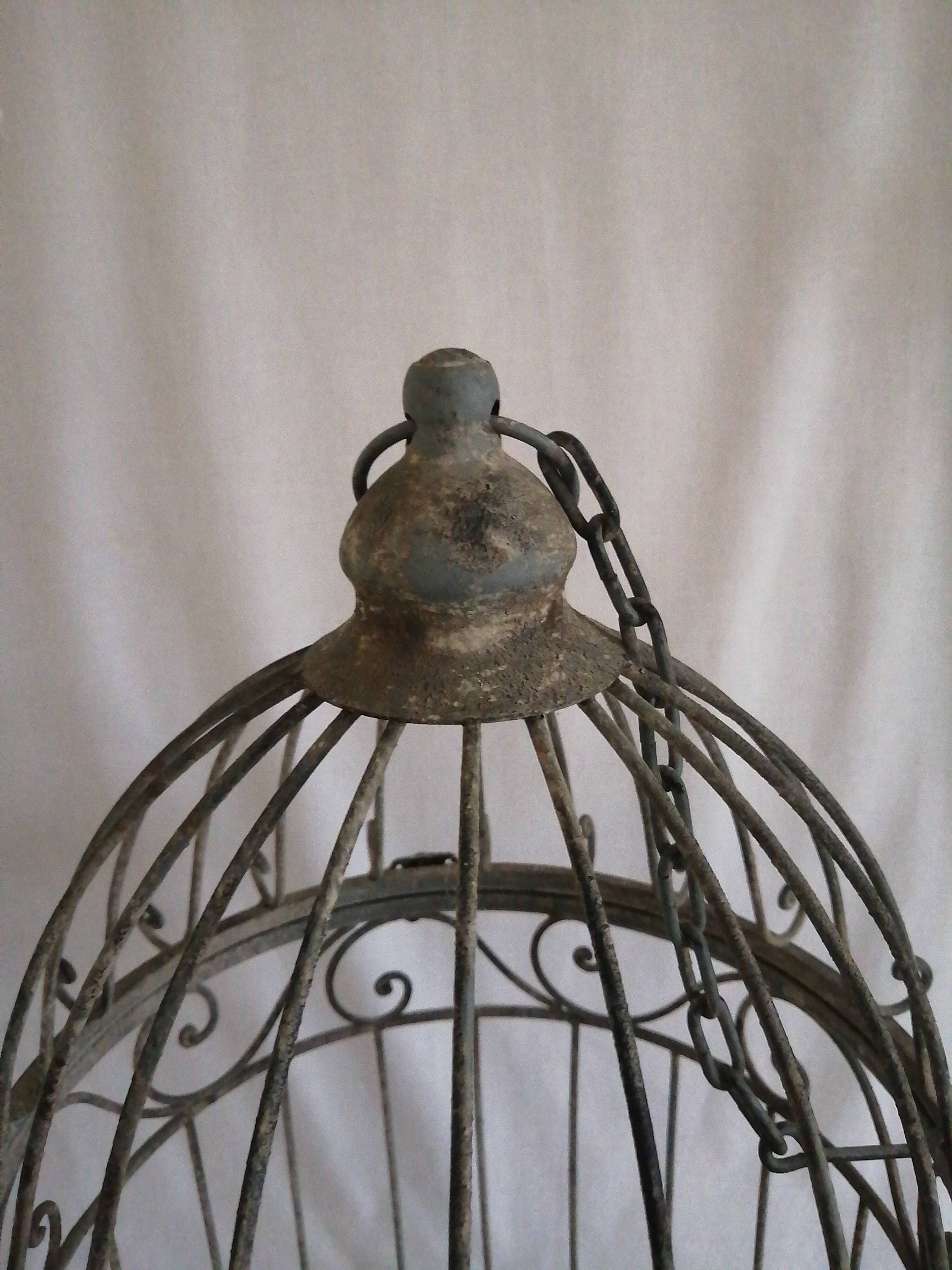 Aged metal cage