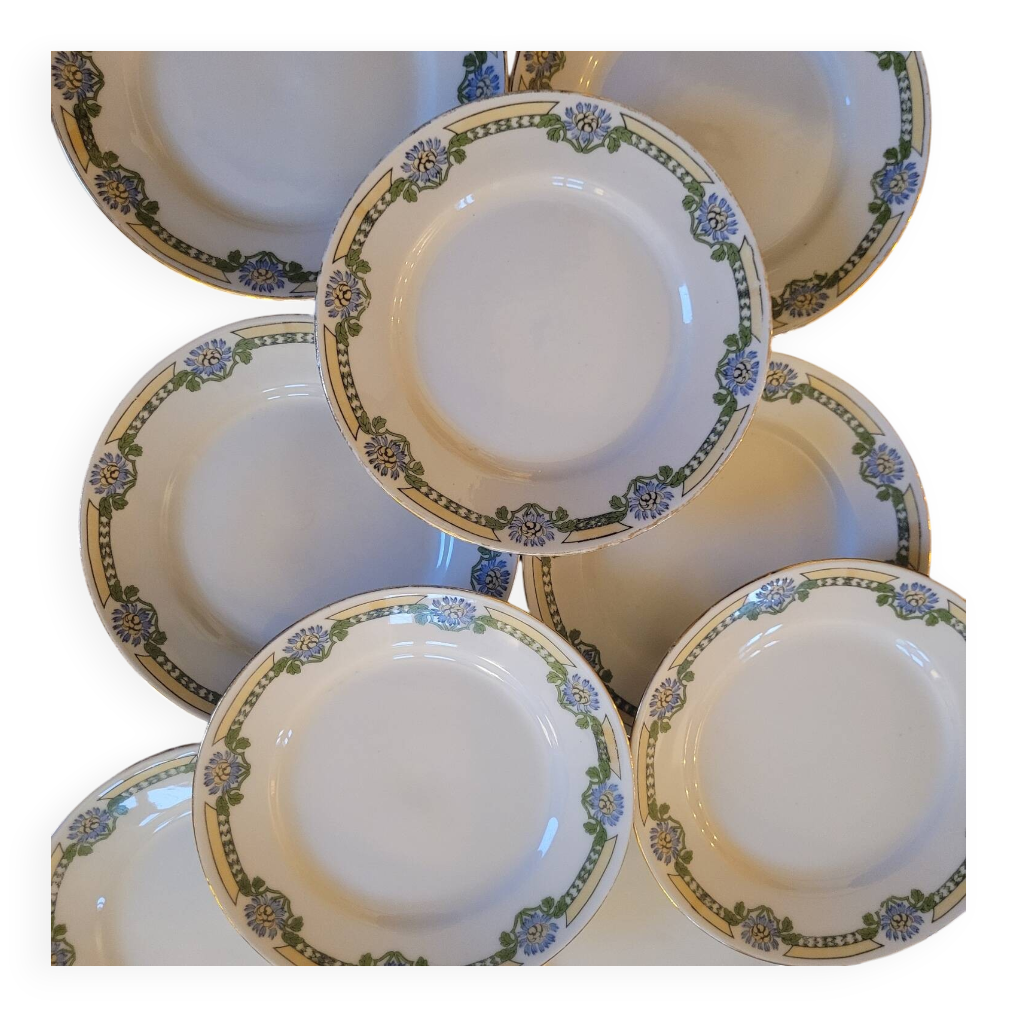 Set of 10 fine porcelain plates with Art Deco decoration.