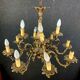 Napoleon III style chandelier in gilded bronze and patinated with putti decorations