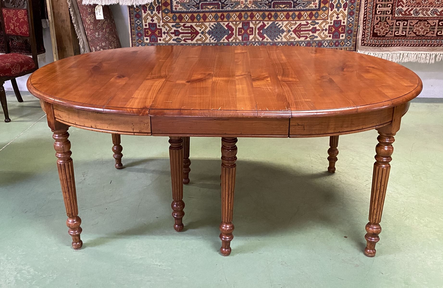 Louis Philippe round table 8 feet in cherry with 6 extensions