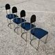 Set of 4 Bauhaus tubular steel chairs with wooden seats.