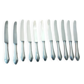 11 couteaux en métal argenté