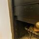 Marble fireplace surround with closed hearth frame.