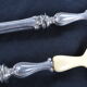 Salad serving set in antique ivory, silver-plated handle.