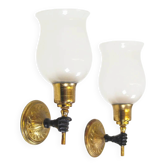 Pair of 'torch' wall lamps in the style of Maison Jansen