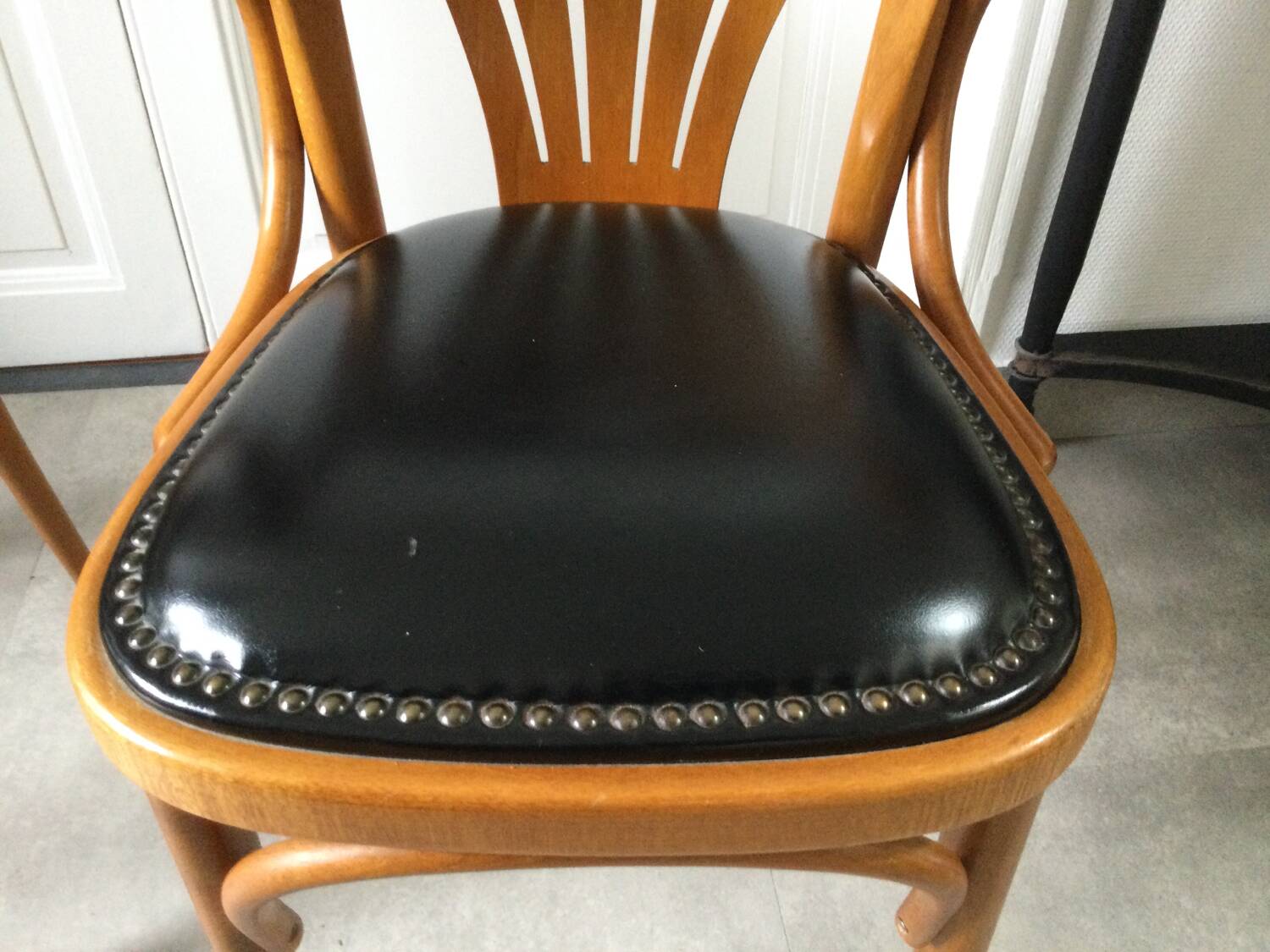 Pair of curved wooden bistro armchairs
