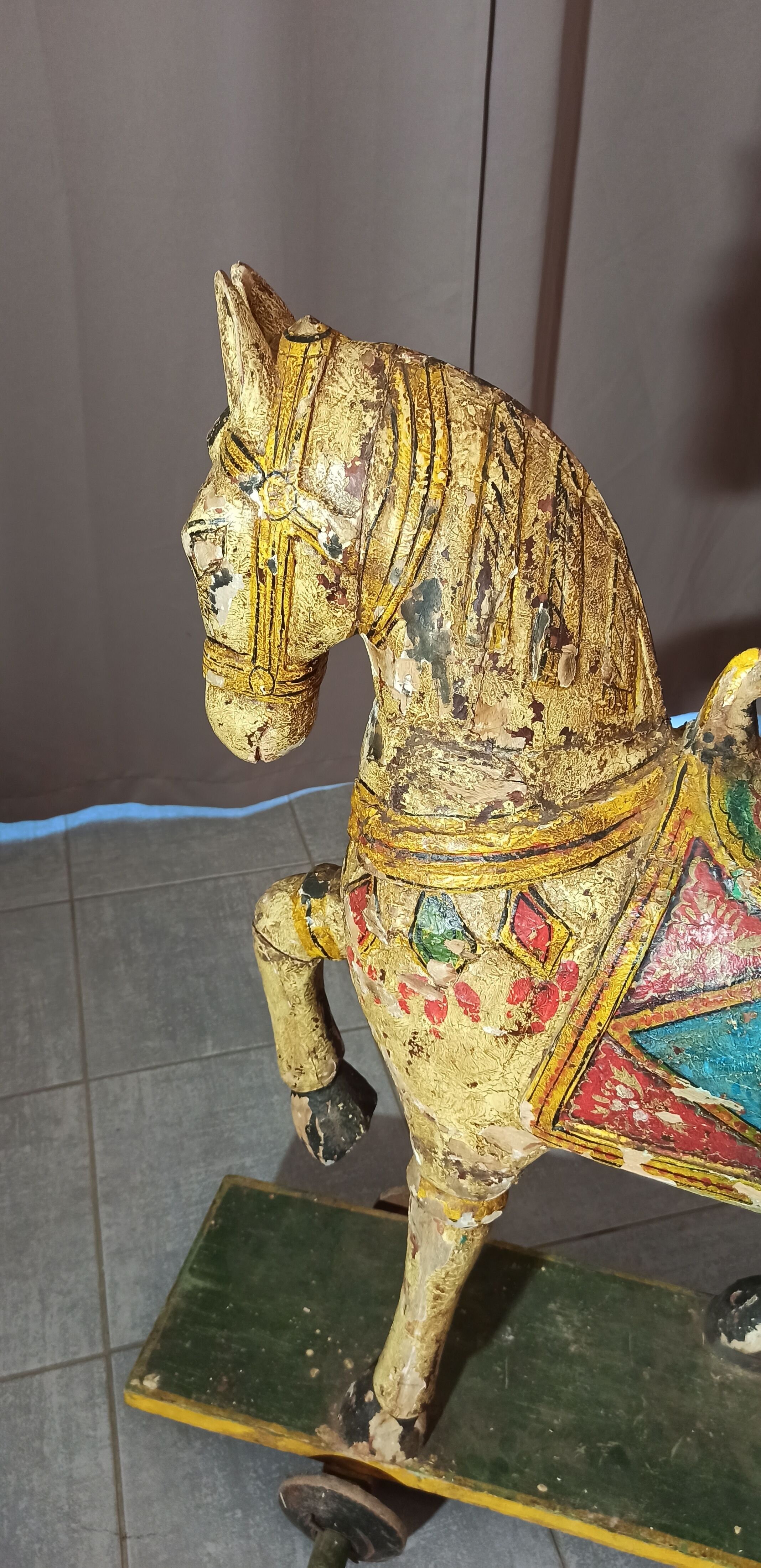 Old horse with wheels