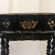 Napoleon III work table in blackened burgundy wood with gilded highlights.
