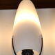 Louis Kalff opaline and metal wall light from the 1950s.