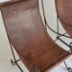 Paire de fauteuils en fer forgé et cuir vintage