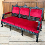 Large Japanese-style sofa in carved wood and red velvet, 19th century