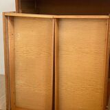 Vintage 1960s chest of drawers with covered handles.