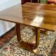 Table époque art déco à plateau ouvrant loupe de noyer