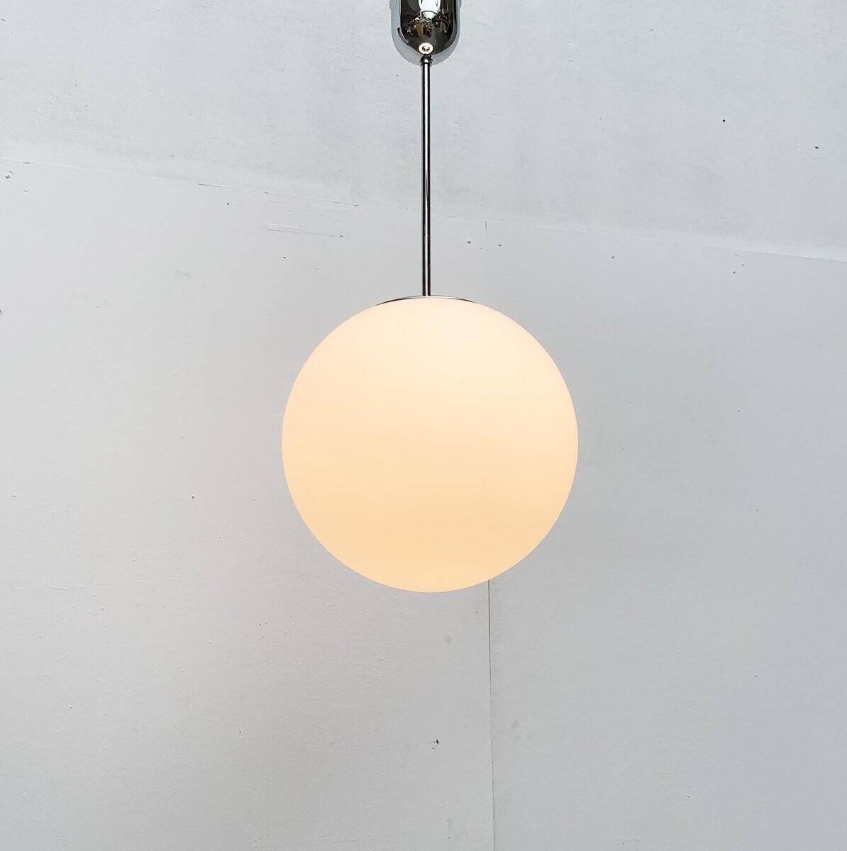 Vintage German space age glass ball pendant lamp by Limburg.