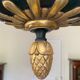 Empire style chandelier with four lights in sheet metal, bronze with patina and gilding