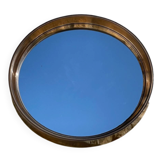 Vintage round smoked plastic mirror, circa 1970s.