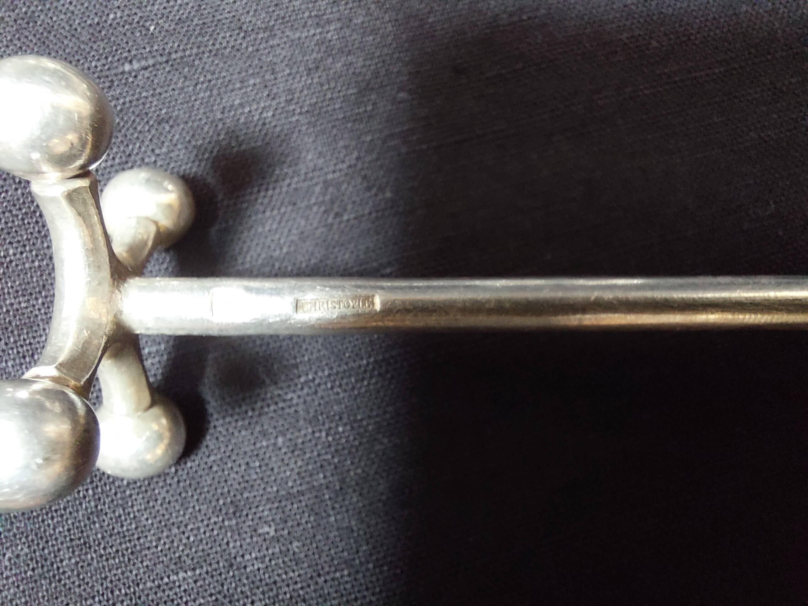 17 porte-couteaux Christofle en métal argenté modèle Atonium