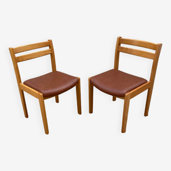 Pair of vintage wood and Skai chairs