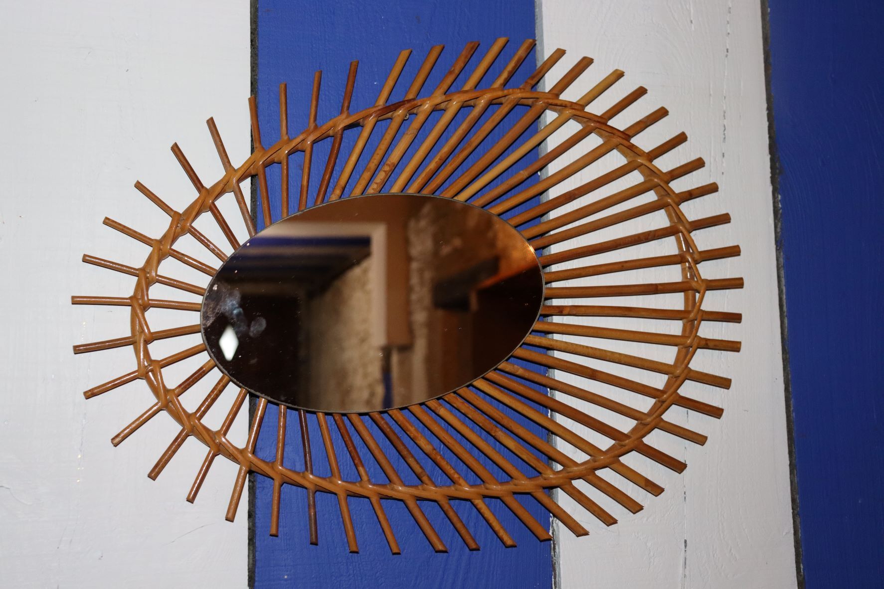 Oval rattan mirror
