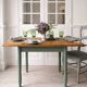 Table, vintage desk with smoked green legs, oak top.