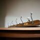 Vintage industrial wooden coat rack with porcelain hooks