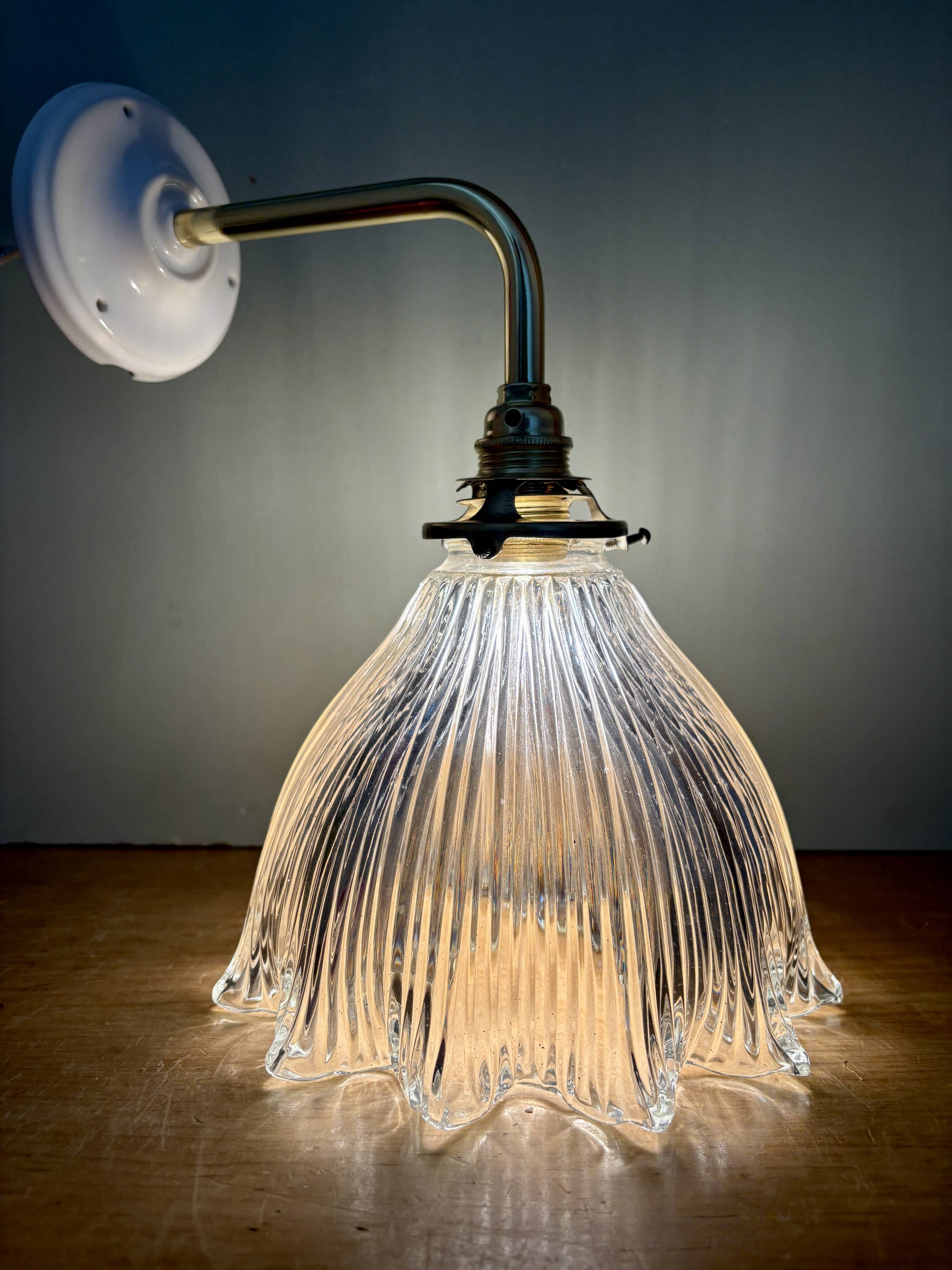 Elbow wall lamp with vintage holophane glass shade