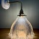 Elbow wall lamp with vintage holophane glass shade