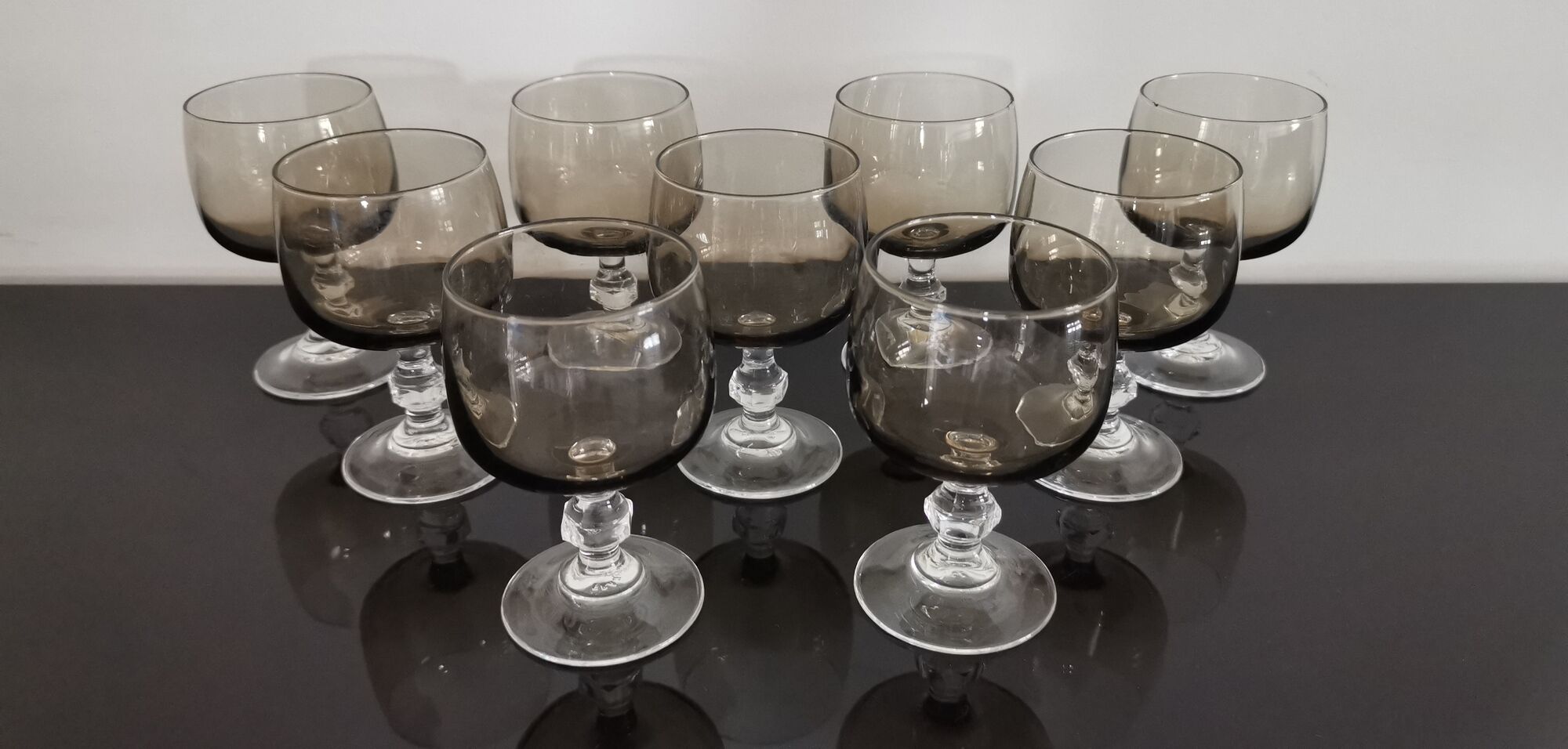 9 glasses of white wine on vintage stand Luminarc Smoked Black
