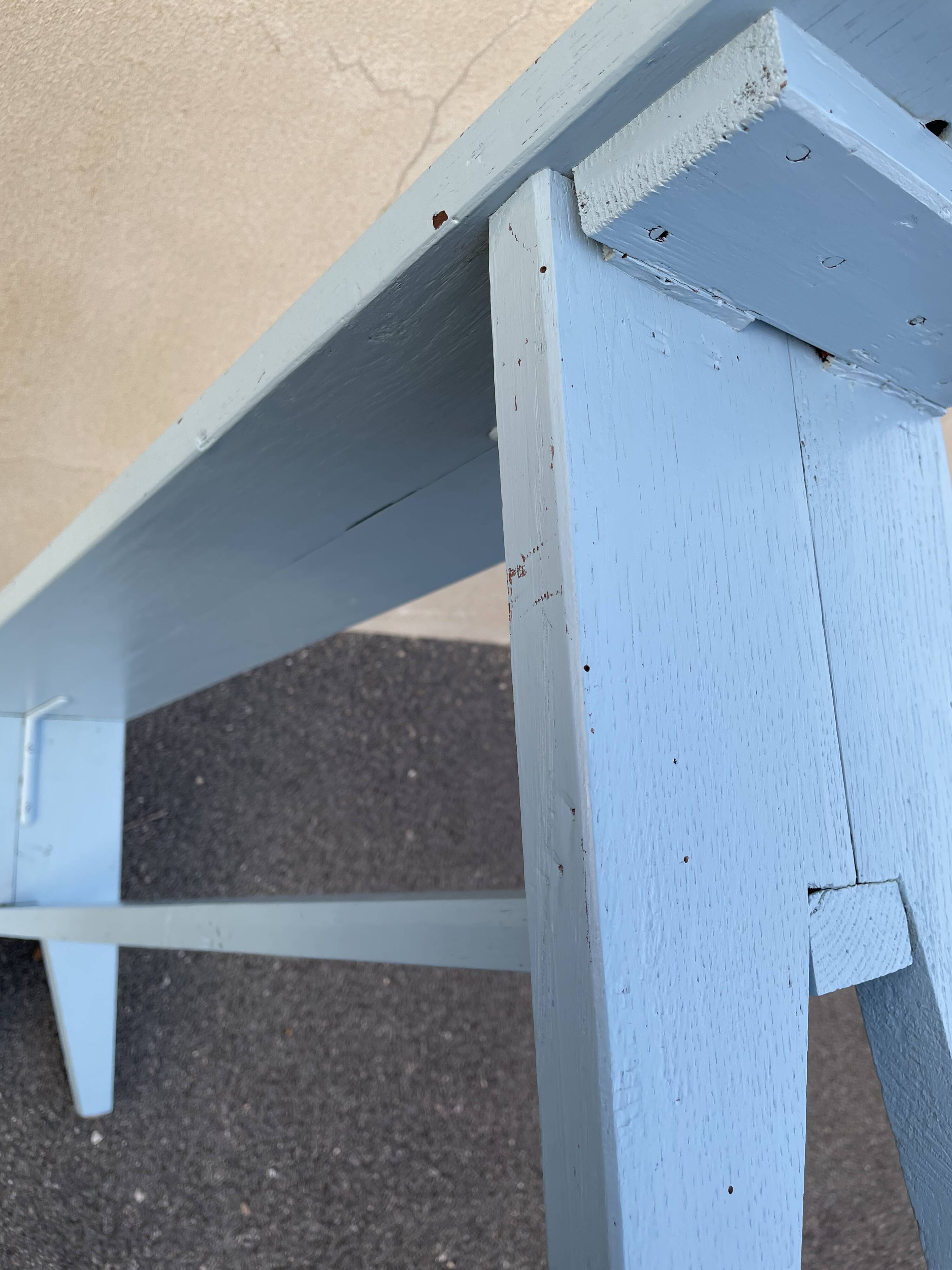 Blue painted wooden bench