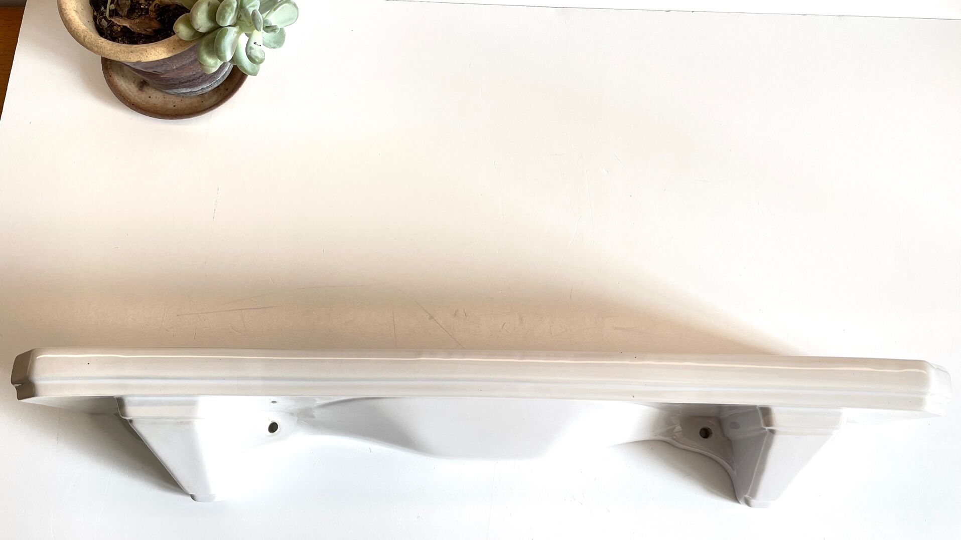 Vintage ceramic wall shelf