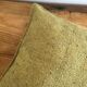 Green mottled wool cushion