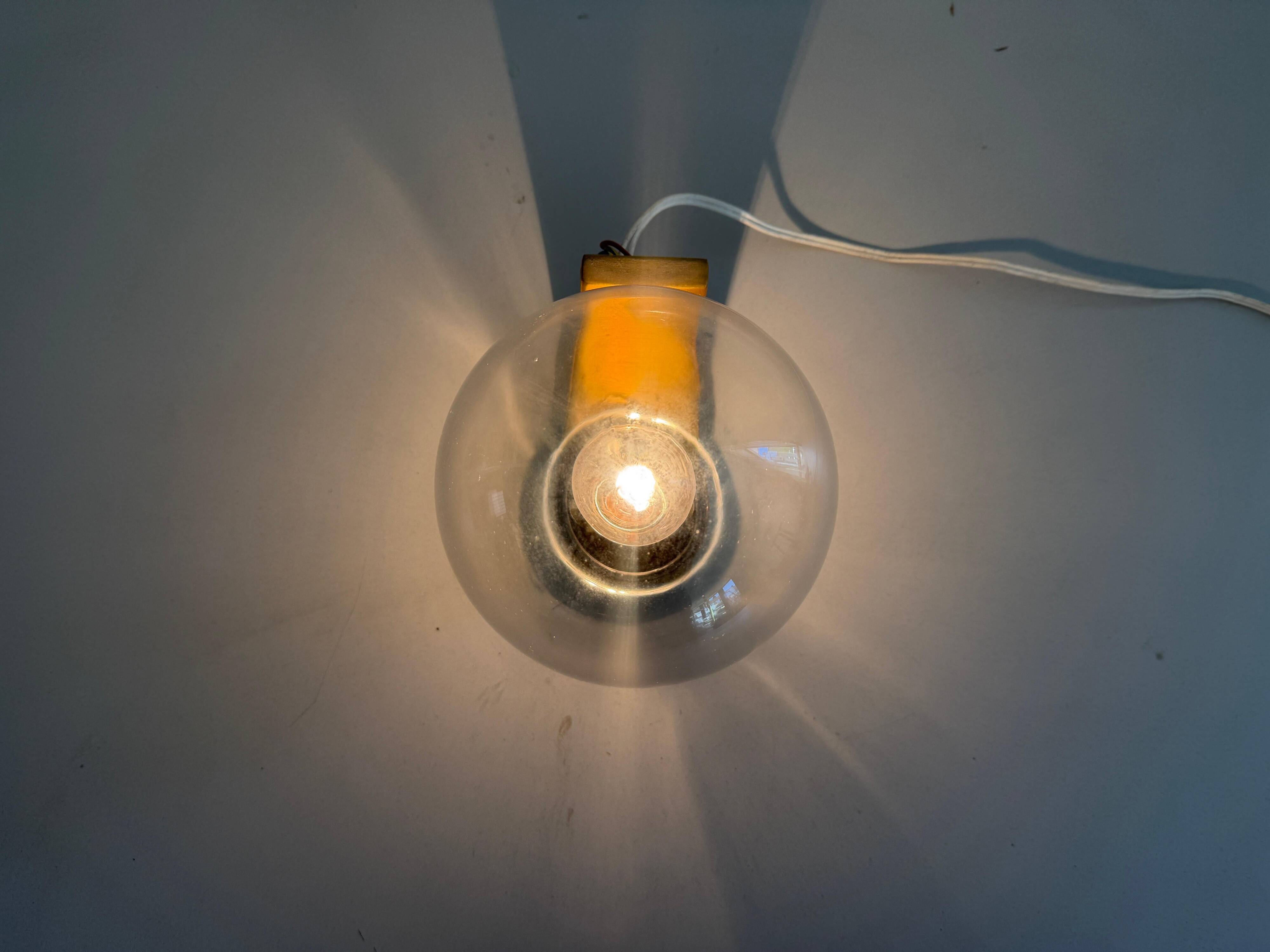 Simple glass and brass wall light from the mid-century, 1960, Germany.