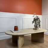 Oval coffee table in raw travertine
