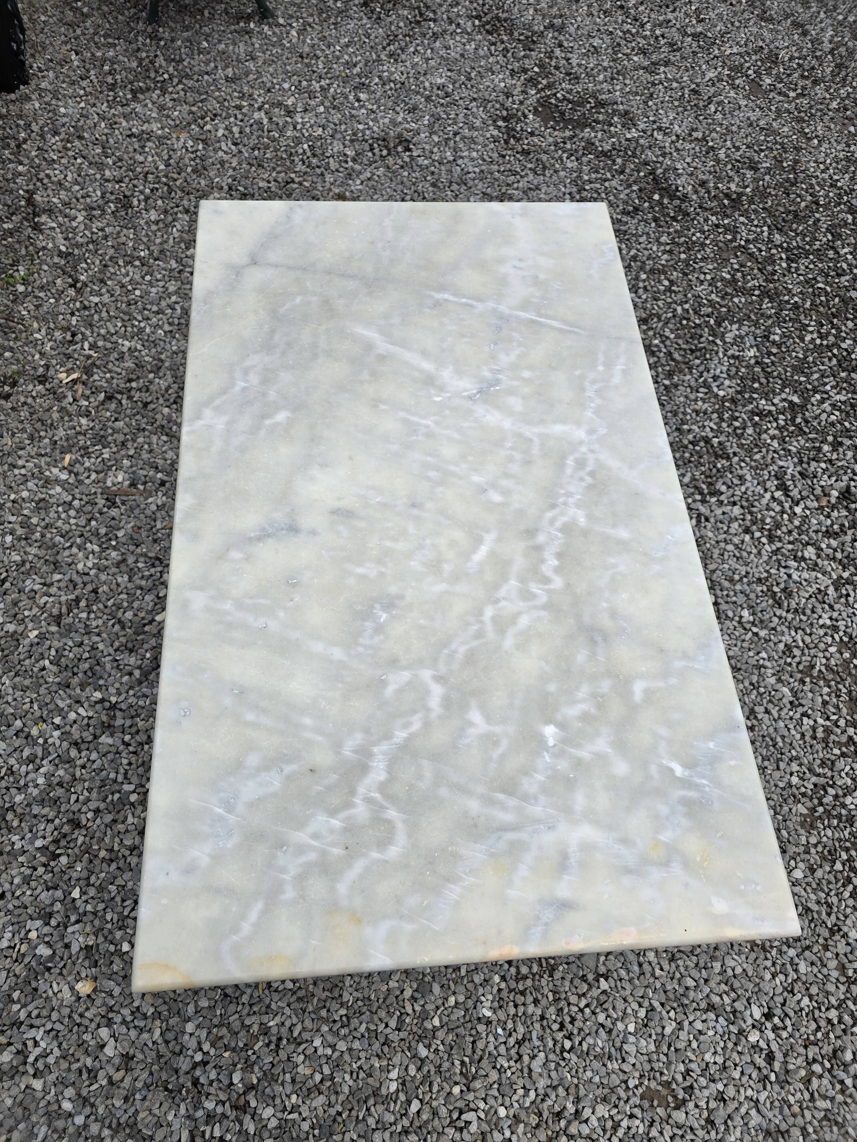 Bistro table with marble top and cast iron base