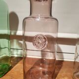 Goose-hued glass apothecary bottle